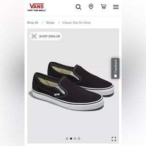 Black Vans (classic slip on shoe)